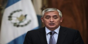 Guatemalan President Perez Molina speaks with the media in Guatemala City