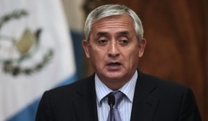 Guatemalan President Perez Molina speaks with the media in Guatemala City