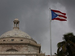 479120986-the-puerto-rican-flag-flies-near-the-capitol-building.jpg.CROP.promo-xlarge2