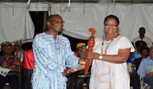 Hillary-Brown-accepts-reparations-baton
