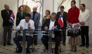 firma de acuerdo + cooperación + cuba + chile